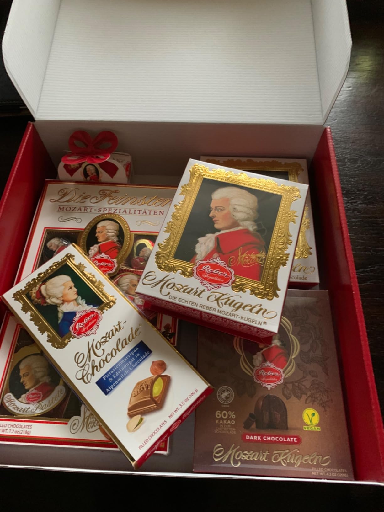 Reber Klassik klein Osterschokolade Set 16 Pralinen 2 Tafeln
