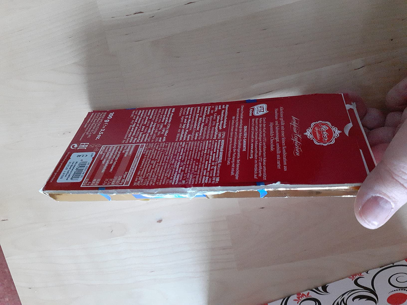 Reber Confiserie-Chocolade Edelnougat Schokolade 100g Sahne